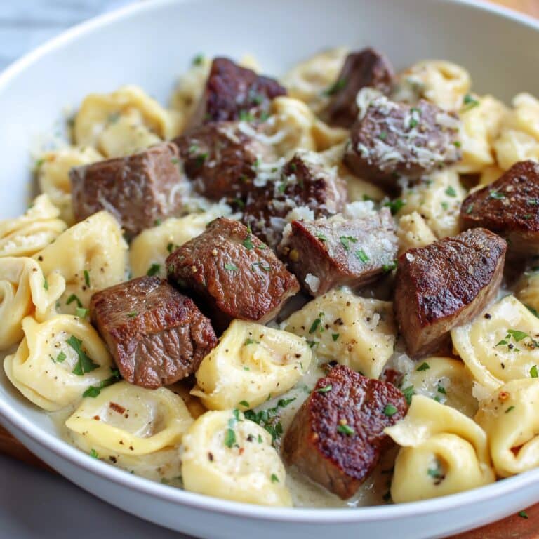 Steak Bites and Shell Pasta in Garlic Butter Alfredo Sauce Recipe