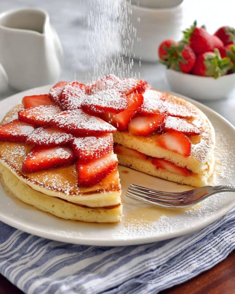 Giant Fluffy Pancakes with Strawberries and Golden Syrup Recipe